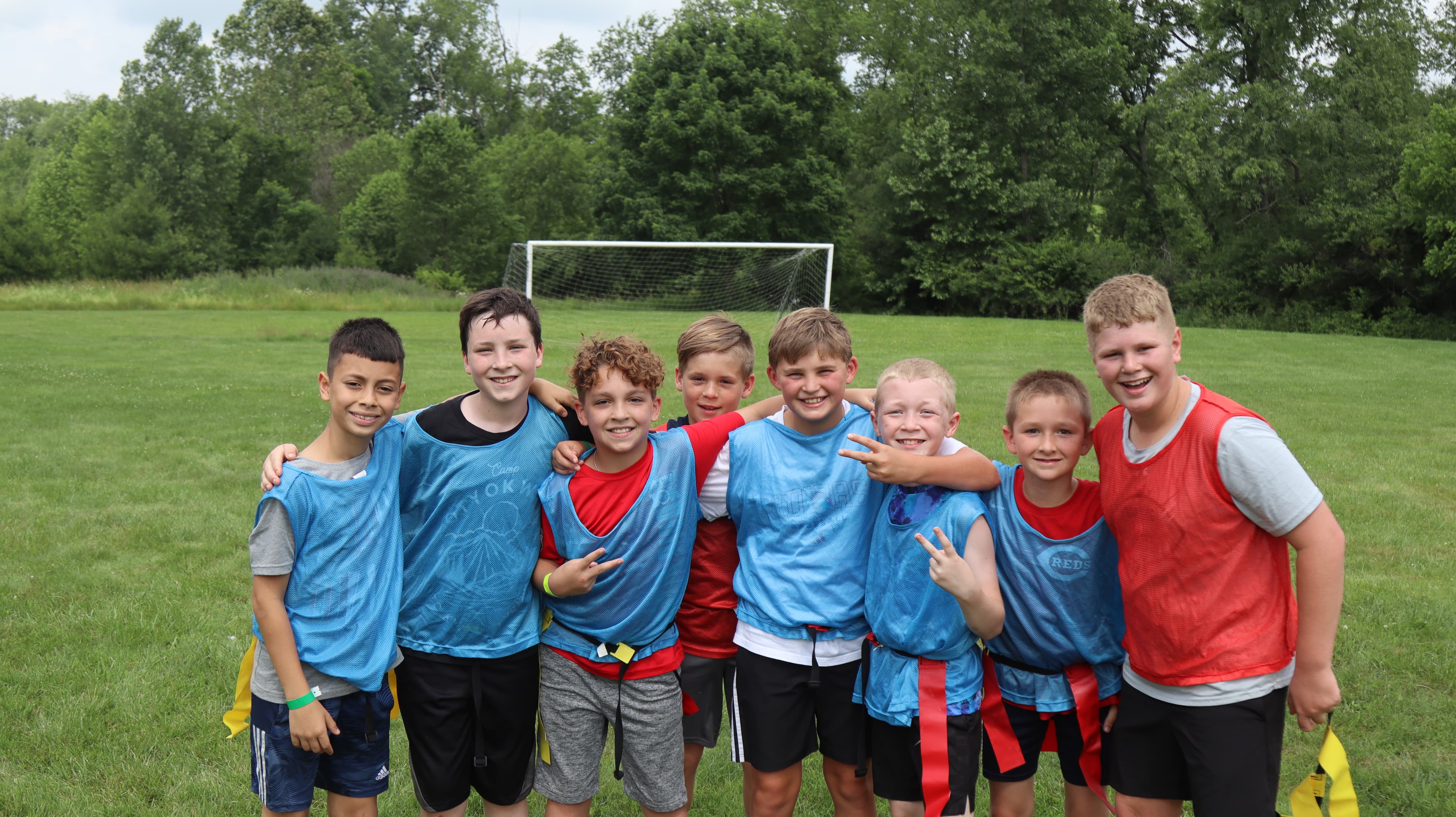 Junior campers enjoying summer activities at Camp Otyokwah