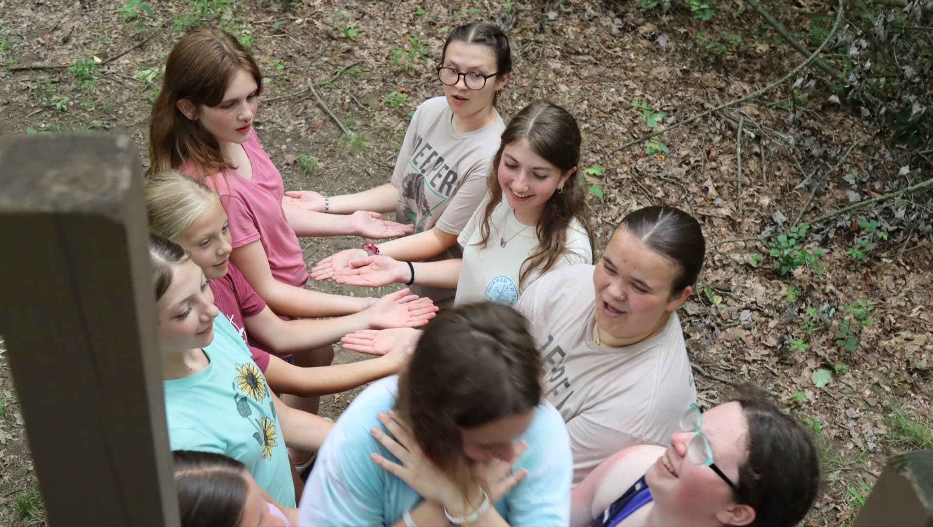 Cabin counselor with campers at Camp Otyokwah