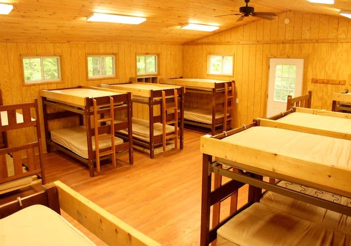 Seasonal cabin interior with bunk beds