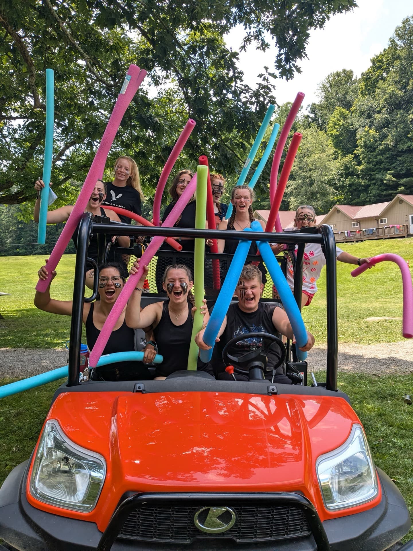 LIT group serving together at Camp Otyokwah