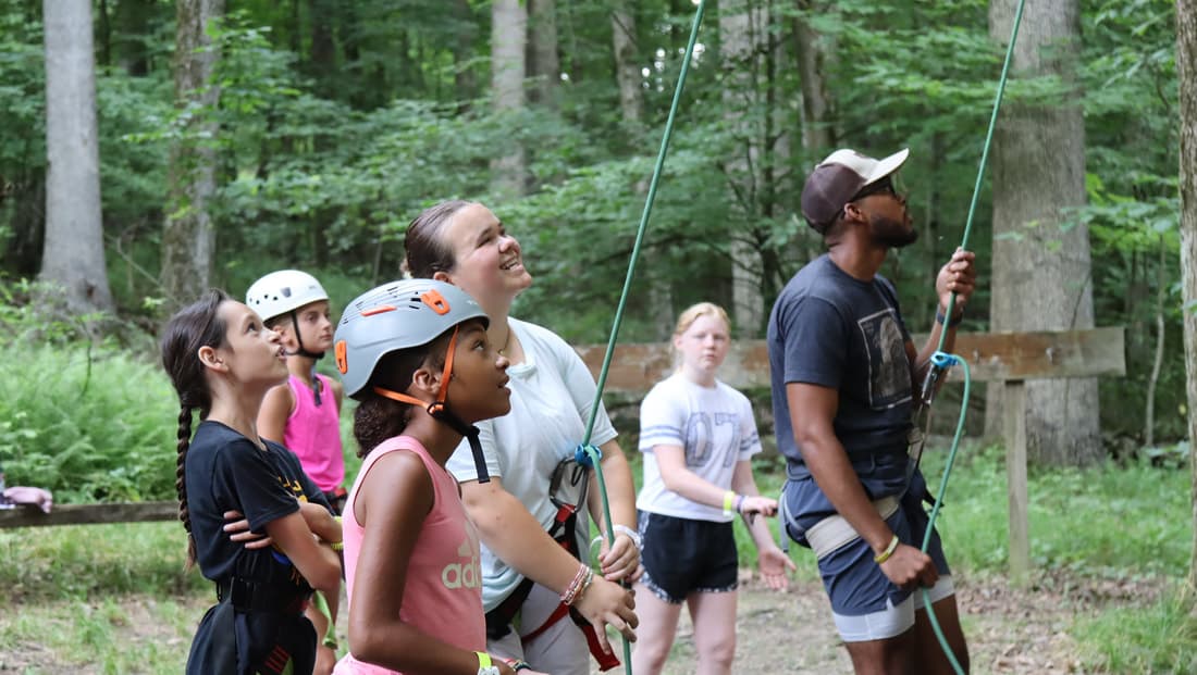 Junior campers enjoying summer activities at Camp Otyokwah
